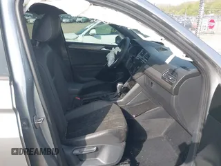2022 Volkswagen Tiguan SE R-Line Black with VIN 3VV8B7AX7NM030703, listed as a IAAI auction lot 42135974 with 57,116 mi miles and . Bid and sale history available at DreamBid. Image 5.
