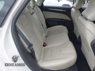 2016 Ford Fusion Titanium with VIN 3FA6P0SU5GR287017, listed as a IAAI auction lot 42316622 with 97,000 mi miles and . Bid and sale history available at DreamBid. Image 8.
