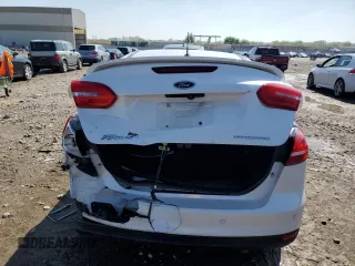 2018 Ford Focus Titanium with VIN 1FADP3J21JL294061, listed as a Copart auction lot 53827375 with 194,577 mi miles and Salvage title. Bid and sale history available at DreamBid. Image 6.