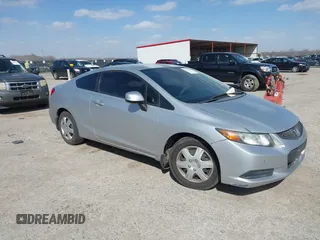 2012 Honda Civic Cpe LX with VIN 2HGFG3B52CH549698, listed as a IAAI auction lot 41818647 with 100,975 mi miles. Bid and sale history available at carsss.com. Image 1.