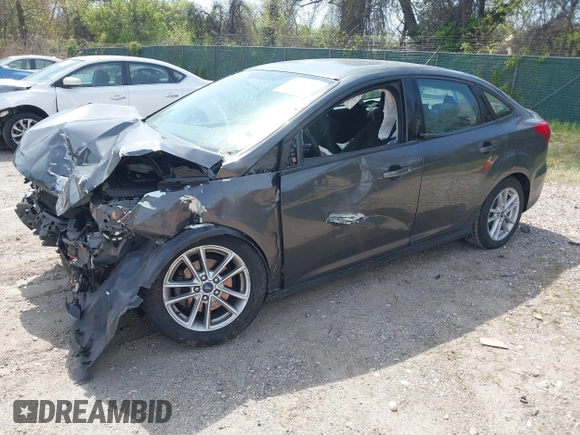 2017 Ford Focus SE with VIN 1FADP3F20HL335881, listed as a IAAI auction lot 42074241 with 127,741 mi miles. Bid and sale history available at carsss.com. Image 2.