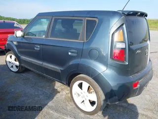 2010 Kia Soul + with VIN KNDJT2A23A7069815, listed as a IAAI auction lot 40173837 with 116,028 mi miles. Bid and sale history available at carsss.com. Image 3.
