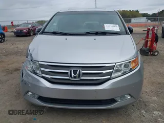 2012 Honda Odyssey Touring with VIN 5FNRL5H98CB026754, listed as a IAAI auction lot 41935562 with 165,626 mi miles. Bid and sale history available at carsss.com. Image 12.