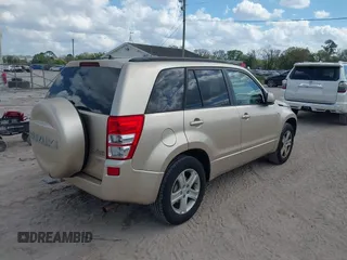 2008 Suzuki Grand Vitara Luxury z VIN JS3TD947384100130, wystawiony jako IAAI lot #41713955 z przebiegiem 180 631 mil mil oraz . Historia ofert i sprzedaży dostępna na DreamBid. Obrazek 4.