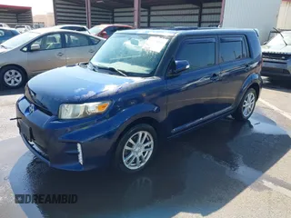 2014 Scion xB with VIN JTLZE4FE6EJ057604, listed as a IAAI auction lot 41528031 with 48,403 mi miles. Bid and sale history available at carsss.com. Image 17.