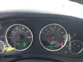 2014 Jeep Wrangler Sport with VIN 1C4AJWAGXEL319749, listed as a IAAI auction lot 41752779 with 140,045 mi miles and . Bid and sale history available at DreamBid. Image 7.