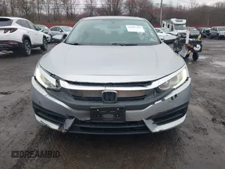 2016 Honda Civic EX with VIN 19XFC2F75GE217935, listed as a IAAI auction lot 41963307 with 87,477 mi miles and . Bid and sale history available at DreamBid. Image 12.