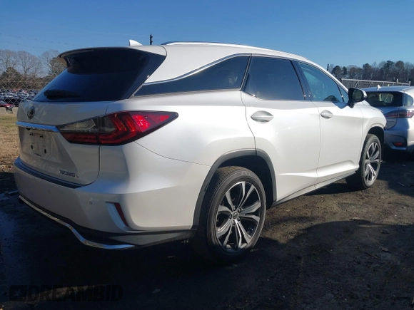 2019 Lexus RX 350L Premium with VIN JTJDZKCA0K2019725, listed as a IAAI auction lot 41303759 with 89,848 mi miles and . Bid and sale history available at DreamBid. Image 4.