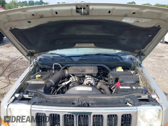 2007 Jeep Commander Sport z VIN 1J8HG48K87C696538, wystawiony jako IAAI lot #39853716 z przebiegiem 226 491 mil mil oraz . Historia ofert i sprzedaży dostępna na DreamBid. Obrazek 10.
