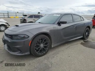 2019 Dodge Charger GT with VIN 2C3CDXHG1KH567719, listed as a Copart auction lot 51162795 with 86,871 mi miles and Salvage Title. Bid and sale history available at DreamBid. Image 1.