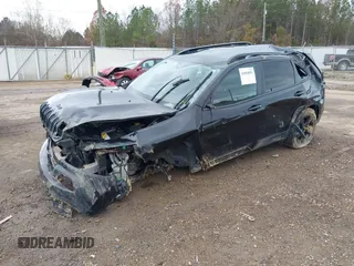 2016 Jeep Cherokee Latitude with VIN 1C4PJLCSXGW229710, listed as a IAAI auction lot 41094091 with 131,501 mi miles. Bid and sale history available at carsss.com. Image 20.