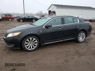 2015 Lincoln MKS with VIN 1LNHL9DK7FG606935, listed as a Copart auction lot 81991384 with 82,097 mi miles and Salvage Title. Bid and sale history available at carsss.com. Image 1.