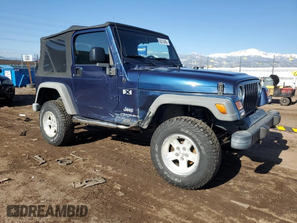 2003 Jeep Wrangler X with VIN 1J4FA39S43P338732, listed as a Copart auction lot 56315495 with 135,480 mi miles and Salvage title. Bid and sale history available at DreamBid. Image 4.