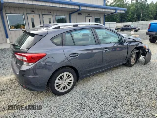 2018 Subaru Impreza Premium with VIN 4S3GTAD64J3715454, listed as a Copart auction lot 64798345 with 63,467 mi miles and Salvage title. Bid and sale history available at DreamBid. Image 3.