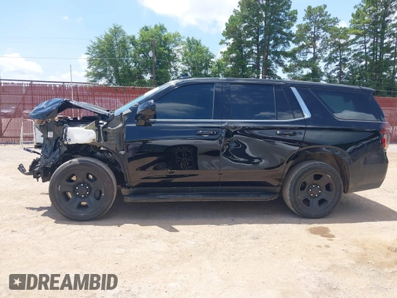 2023 Chevrolet Tahoe Commercial with VIN 1GNSCLED8PR515600, listed as a IAAI auction lot 42552810 with 20,016 mi miles and . Bid and sale history available at DreamBid. Image 14.