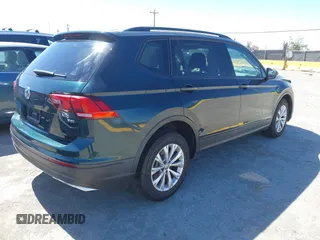 2018 Volkswagen Tiguan S with VIN 3VV1B7AX1JM165641, listed as a IAAI auction lot 42699622 with 75,354 mi miles and . Bid and sale history available at DreamBid. Image 4.