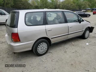1996 Honda Odyssey with VIN JHMRA184XTC004544, listed as a Copart auction lot 53875355 with 165,945 mi miles and Salvage title. Bid and sale history available at DreamBid. Image 3.