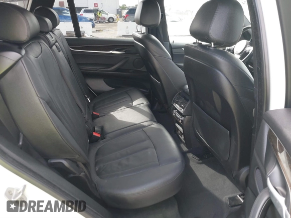 2016 BMW X5 xDrive35i with VIN 5UXKR0C56G0P32566, listed as a IAAI auction lot 41899474 with 79,563 mi miles. Bid and sale history available at carsss.com. Image 8.