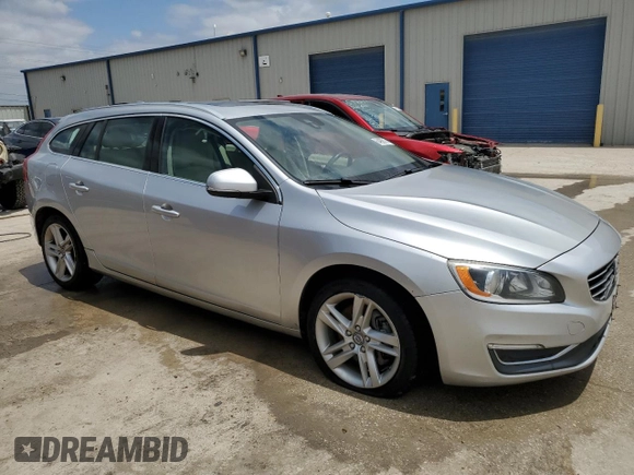 2015 Volvo V60 z VIN YV1612SC1F1191466, wystawiony jako Copart lot #64906184 z przebiegiem 89 444 mil mil oraz Szkoda całkowita • Salvage title. Historia ofert i sprzedaży dostępna na DreamBid. Obrazek 4.