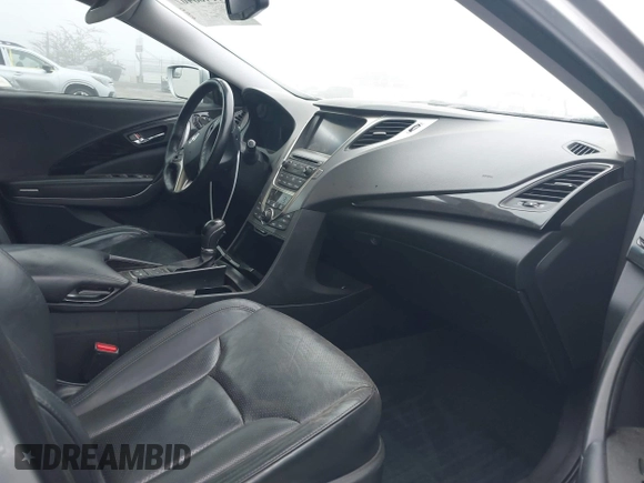 2014 Hyundai Azera Limited with VIN KMHFH4JG7EA388931, listed as a IAAI auction lot 41468407 with 130,597 mi miles and . Bid and sale history available at DreamBid. Image 5.