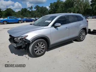 2016 Mazda CX-9 Touring z VIN JM3TCBCY3G0126520, wystawiony jako Copart lot #56539175 z przebiegiem 134 583 mil mil oraz Szkoda całkowita • Salvage title. Historia ofert i sprzedaży dostępna na DreamBid. Obrazek 1.