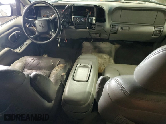 1999 Chevrolet Suburban with VIN 3GNFK16R8XG149091, listed as a Copart auction lot 71300024 with 254,044 mi miles and Salvage Title. Bid and sale history available at carsss.com. Image 8.