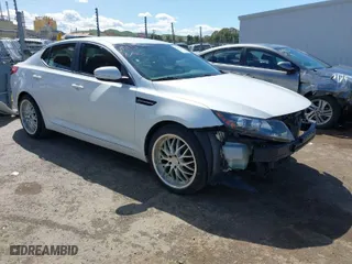 2011 Kia Optima LX with VIN KNAGM4A71B5072995, listed as a IAAI auction lot 41946138 with 196,551 mi miles. Bid and sale history available at carsss.com. Image 1.
