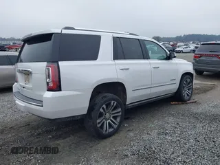 2019 GMC Yukon Denali with VIN 1GKS1CKJ7KR364240, listed as a IAAI auction lot 41645374 with 104,956 mi miles. Bid and sale history available at carsss.com. Image 4.