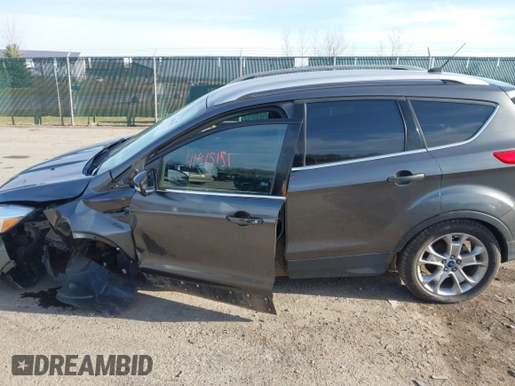 2015 Ford Escape Titanium with VIN 1FMCU9J90FUB58306, listed as a IAAI auction lot 41815151 with 136,835 mi miles. Bid and sale history available at carsss.com. Image 14.