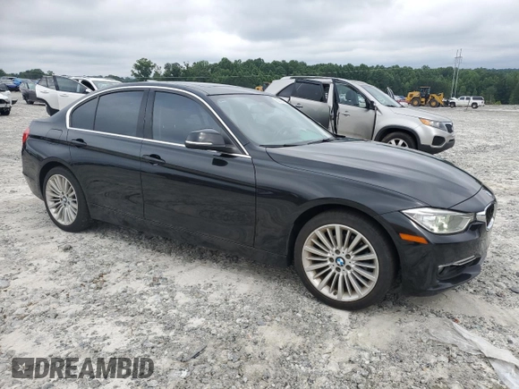 2014 BMW 3 Series 328i with VIN WBA3A5G54ENP31997, listed as a Copart auction lot 60720765 with 107,183 mi miles and Salvage title. Bid and sale history available at DreamBid. Image 4.