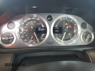 2009 Aston Martin Vantage z VIN SCFBF04CX9GD11858, wystawiony jako Copart lot #53907885 z przebiegiem 87 495 mil mil oraz Szkody całkowita. Historia ofert i sprzedaży dostępna na DreamBid. Obrazek 9.