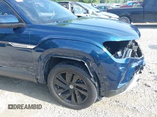 2022 Volkswagen Atlas SE z VIN 1V2HE2CA7NC211835, wystawiony jako IAAI lot #42722660 z przebiegiem 56 112 mil mil oraz . Historia ofert i sprzedaży dostępna na DreamBid. Obrazek 20.