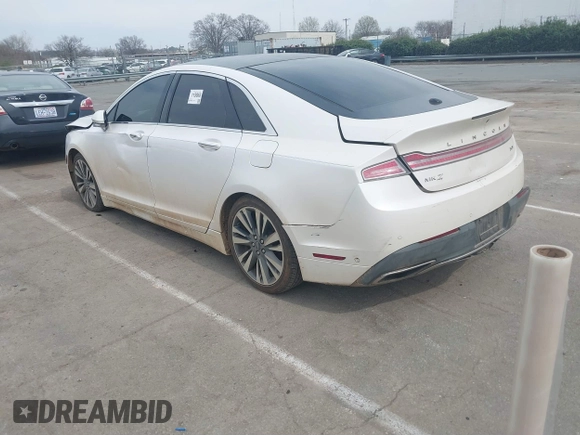 2017 Lincoln MKZ Reserve z VIN 3LN6L5EC2HR613827, wystawiony jako IAAI lot #41800613 z przebiegiem 199 097 mil mil oraz . Historia ofert i sprzedaży dostępna na DreamBid. Obrazek 3.