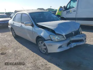 2002 Mitsubishi Lancer LS with VIN JA3AJ36E22U035784, listed as a IAAI auction lot 40628995 with 1 mi miles. Bid and sale history available at carsss.com. Image 1.