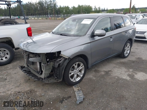 2014 Mitsubishi Outlander GT with VIN JA4JZ4AX9EZ017406, listed as a IAAI auction lot 42291696 with 107,680 mi miles and . Bid and sale history available at DreamBid. Image 2.