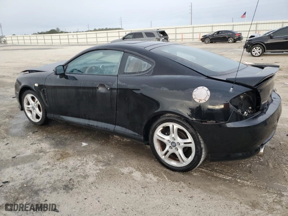 2006 Hyundai Tiburon GT with VIN KMHHN65FX6U224913, listed as a Copart auction lot 80695184 with 146,676 mi miles and Salvage Title. Bid and sale history available at carsss.com. Image 2.
