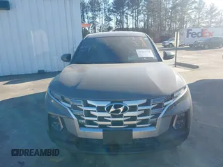 2024 Hyundai Santa Cruz SE z VIN 5NTJADAE5RH088273, wystawiony jako IAAI lot #41563660 z przebiegiem 14 873 mil mil oraz . Historia ofert i sprzedaży dostępna na DreamBid. Obrazek 12.
