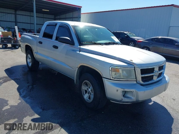 2008 Dodge Dakota SLT with VIN 1D7HE48K78S514290, listed as a IAAI auction lot 41766396 with 208,744 mi miles and . Bid and sale history available at carsss.com. Image 1.