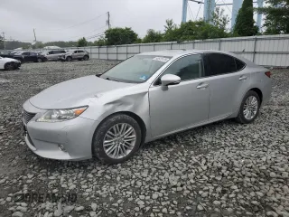 2014 Lexus ES 330 with VIN JTHBK1GG2E2087406, listed as a Copart auction lot 60928105 with 63,251 mi miles and Salvage title. Bid and sale history available at DreamBid. Image 1.