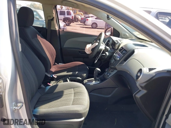 2013 Chevrolet Sonic LT with VIN 1G1JC6SG0D4202398, listed as a IAAI auction lot 42067950 with 141,114 mi miles. Bid and sale history available at carsss.com. Image 5.