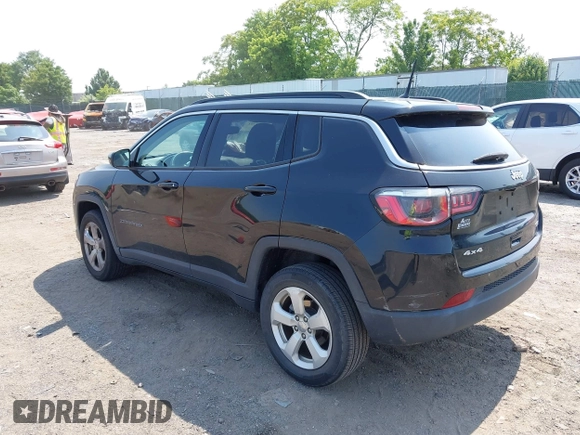 2018 Jeep Compass Latitude with VIN 3C4NJDBB1JT191490, listed as a IAAI auction lot 42429761 with 61,100 mi miles and . Bid and sale history available at DreamBid. Image 3.