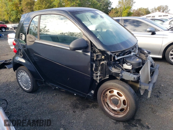 2013 Smart fortwo Passion z VIN WMEEJ9AA1DK717534, wystawiony jako Copart lot #73832094 z przebiegiem Nie podano mil oraz Tytuł czysty. Historia ofert i sprzedaży dostępna na DreamBid. Obrazek 4.