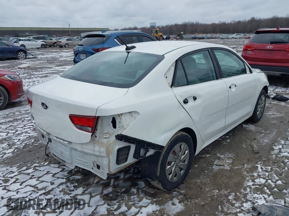 2018 Kia Rio LX with VIN 3KPA24AB8JE057223, listed as a IAAI auction lot 41705738 with 97,674 mi miles. Bid and sale history available at carsss.com. Image 4.