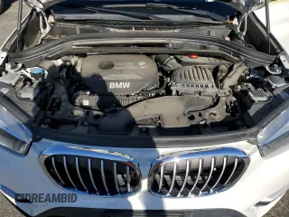 2016 BMW X1 xDrive28i with VIN WBXHT3C32G5E52052, listed as a Copart auction lot 79522024 with 76,995 mi miles and Salvage Title. Bid and sale history available at carsss.com. Image 12.