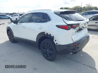 2022 Mazda CX-30 2.5 Turbo Premium Package with VIN 3MVDMBDY3NM437897, listed as a IAAI auction lot 41715776 with 42,771 mi miles. Bid and sale history available at carsss.com. Image 3.