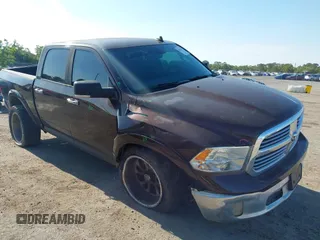 2015 Ram 1500 Big Horn with VIN 3C6RR7LT5FG597847, listed as a IAAI auction lot 42042971 with 212,541 mi miles and . Bid and sale history available at DreamBid. Image 1.