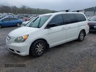 2010 Honda Odyssey EX-L with VIN 5FNRL3H65AB068497, listed as a IAAI auction lot 42013925 with 206,668 mi miles. Bid and sale history available at carsss.com. Image 2.