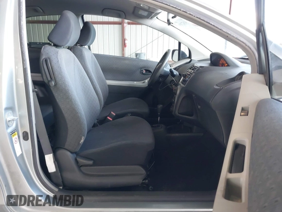 2009 Toyota Yaris with VIN JTDJT903095254673, listed as a IAAI auction lot 41830459 with 320,449 mi miles. Bid and sale history available at carsss.com. Image 5.