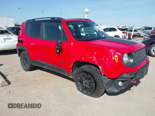2018 Jeep Renegade Trailhawk z VIN ZACCJBCB9JPH37406, wystawiony jako IAAI lot #41822630 z przebiegiem 57 711 mil mil oraz . Historia ofert i sprzedaży dostępna na DreamBid. Obrazek 1.