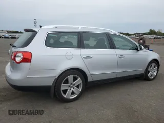 2009 Volkswagen Passat z VIN WVWXK73C39E138994, wystawiony jako Copart lot #70876274 z przebiegiem 118 057 mil mil oraz Czysty tytuł • Clean title. Historia ofert i sprzedaży dostępna na DreamBid. Obrazek 3.